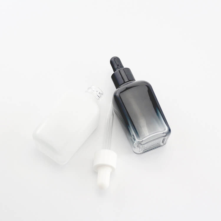 Gradient black white dropper bottle