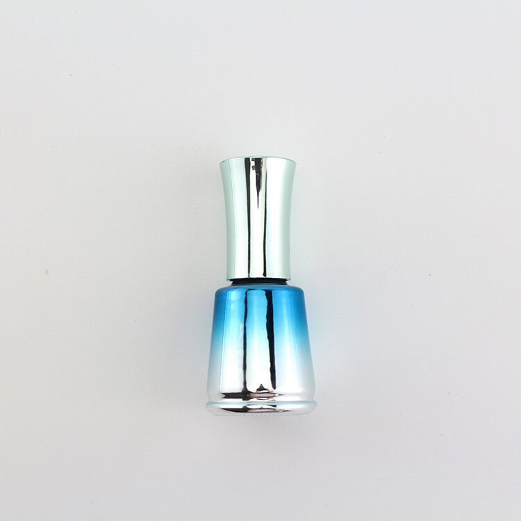 Gradient blue nail polish bottle