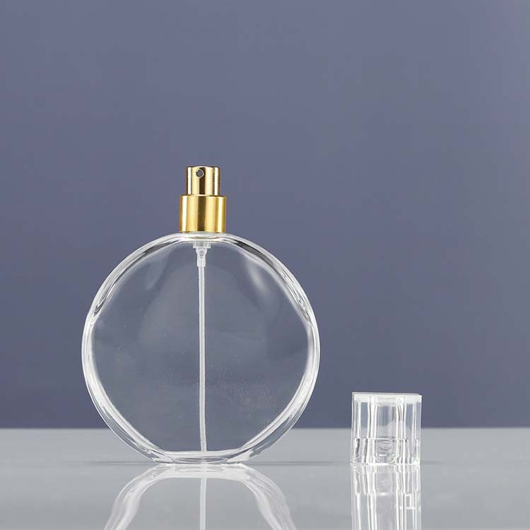 Wholesale Round Perfume Bottle 50ml 100ml Empty Clear Perfume Glass Spray Bottle