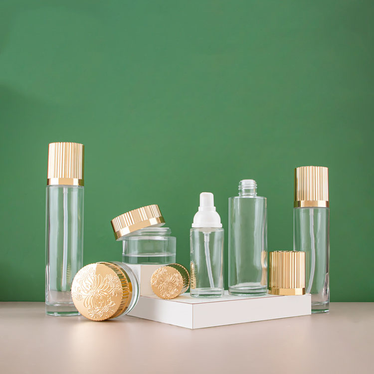 Wholesale Luxury Cosmetic Glass Bottle Set Skin Care Glass Bottles With Gold Lid